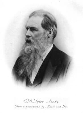 Black-and-white portrait of anthropologist Edward Burnett Tylor, an older man with a white beard.