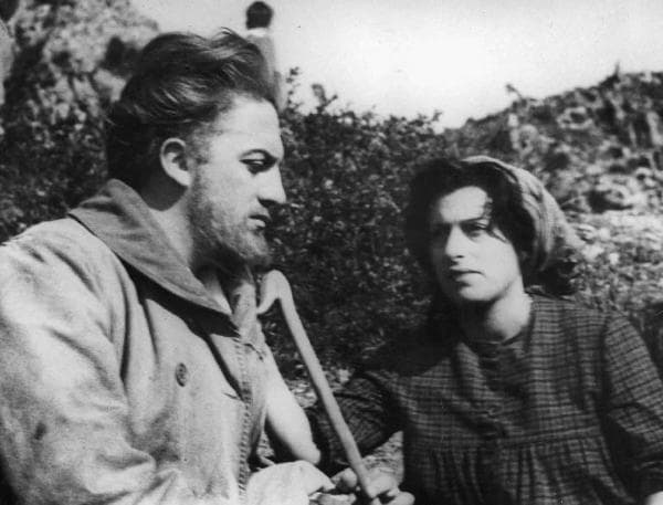 A still from the 1948 film L'Amore showing Anna Magnani and Federico Fellini in the segment The Miracle.