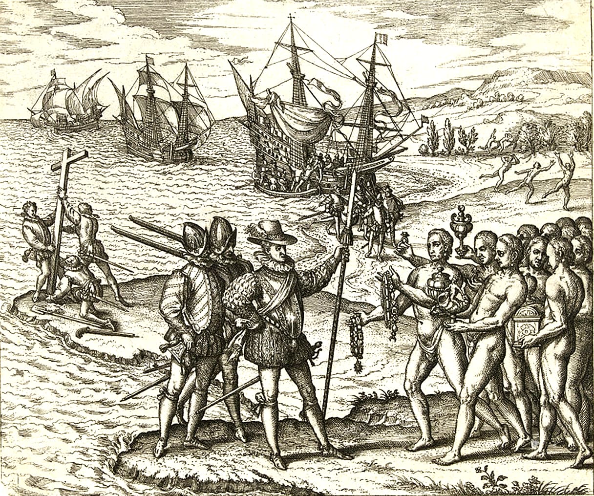 An engraving by Theodor de Bry showing Columbus and his crew coming ashore and meeting Indigenous people, with ships anchored behind them.