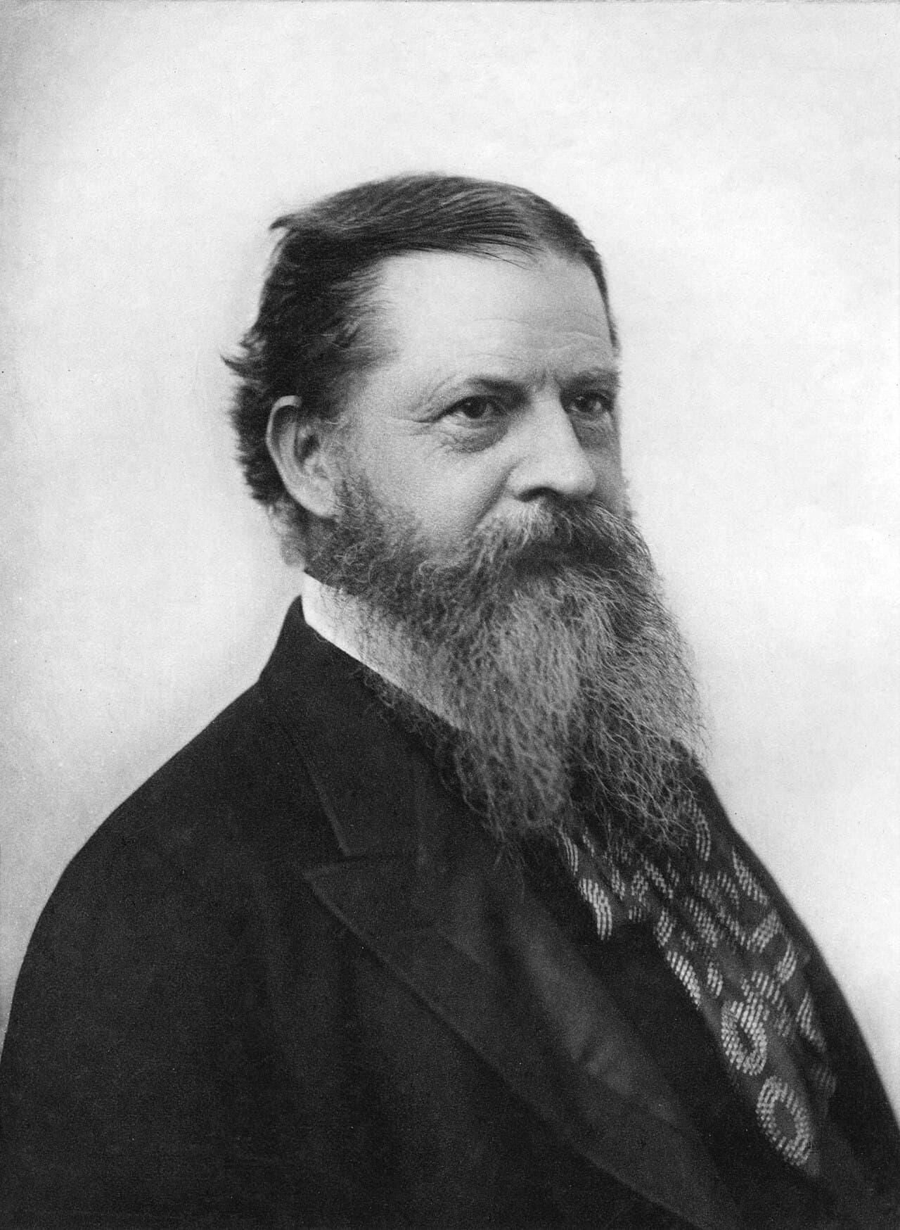 Black-and-white portrait of philosopher and logician Charles Sanders Peirce.