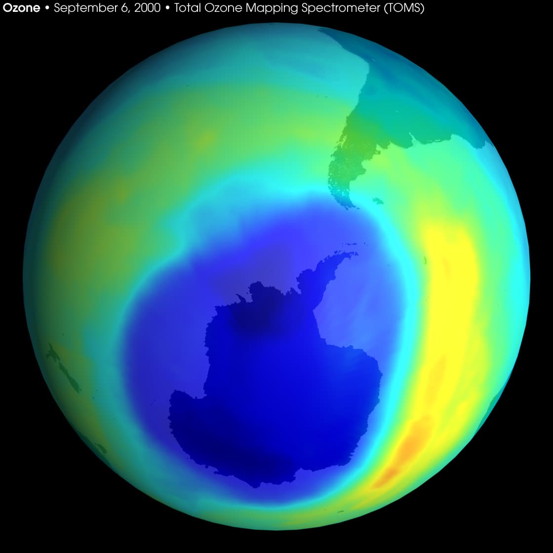 Satellite map of the Southern Hemisphere with a large blue and purple area over Antarctica showing very low ozone.