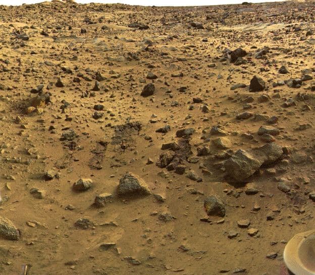A reddish, rock-strewn Martian landscape photographed by the Viking 1 lander in 1976.