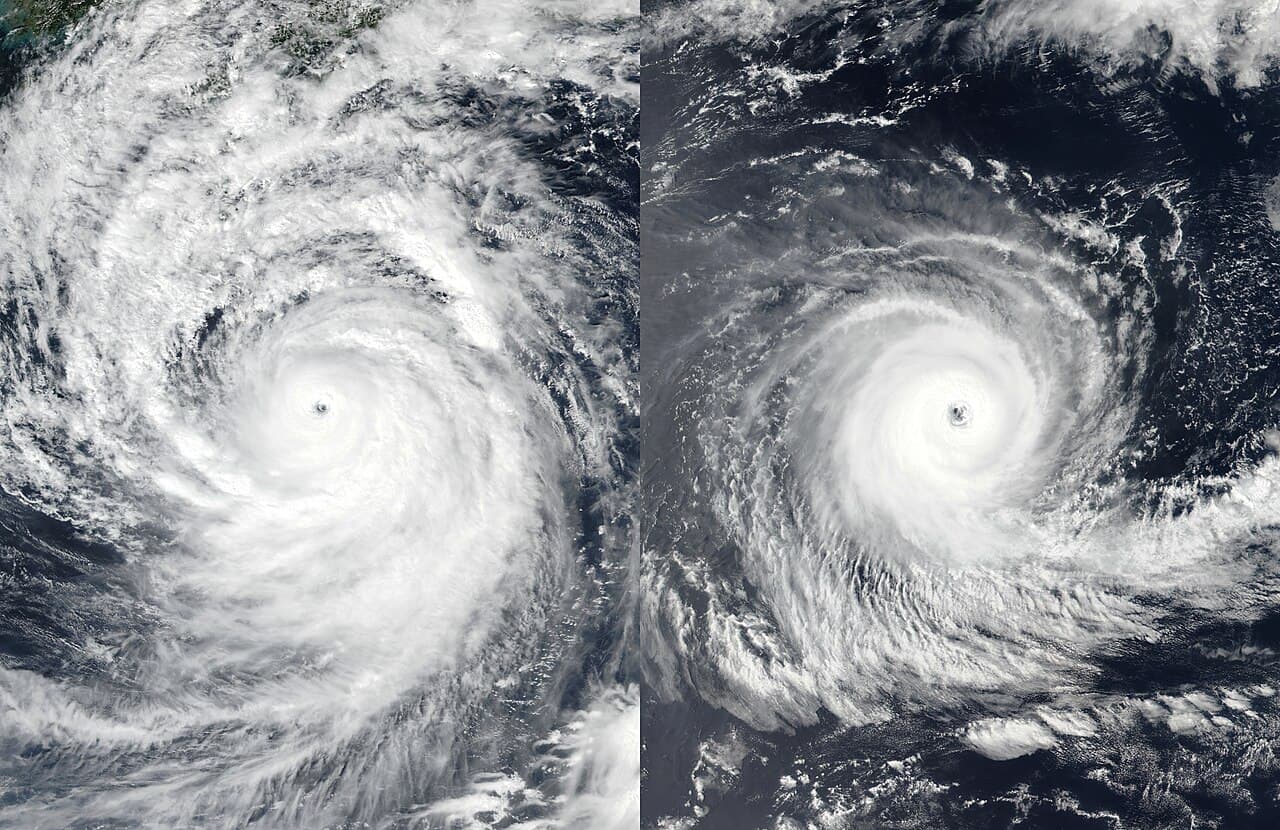 Two satellite images of tropical cyclones side by side, one in the Northern Hemisphere spinning counterclockwise and one in the Southern Hemisphere spinning clockwise.